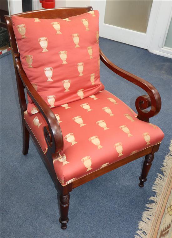 A set of six 19th century North European carved mahogany dining chairs (two with arms) and a pair of matching cushions